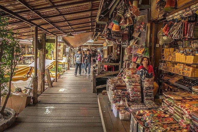 Pattaya Floating Market with Return Transfer - Shopping for Wood Carvings, Clocks, and Thai Wear Without Guesswork